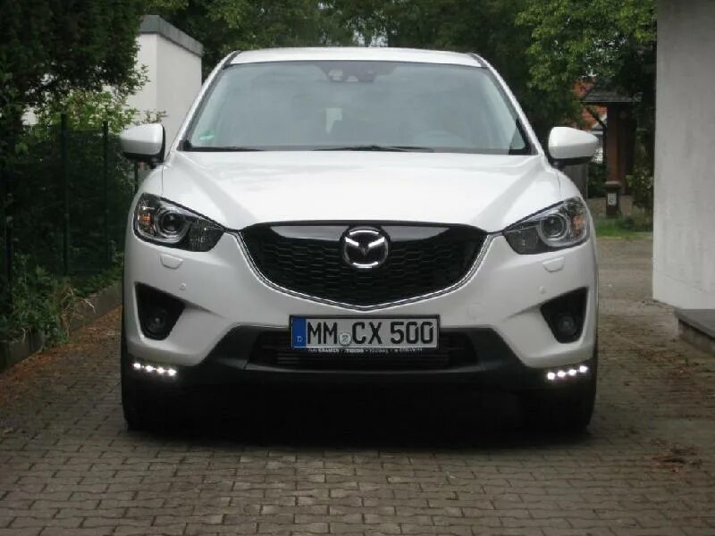 дневные ходовые огни mazda cx-5. дхо мазда cx5. лампы мазда сх5 2014. насадка на глушитель форд фокус 2 1. лампа дальний свет мазда сх 5 2014.