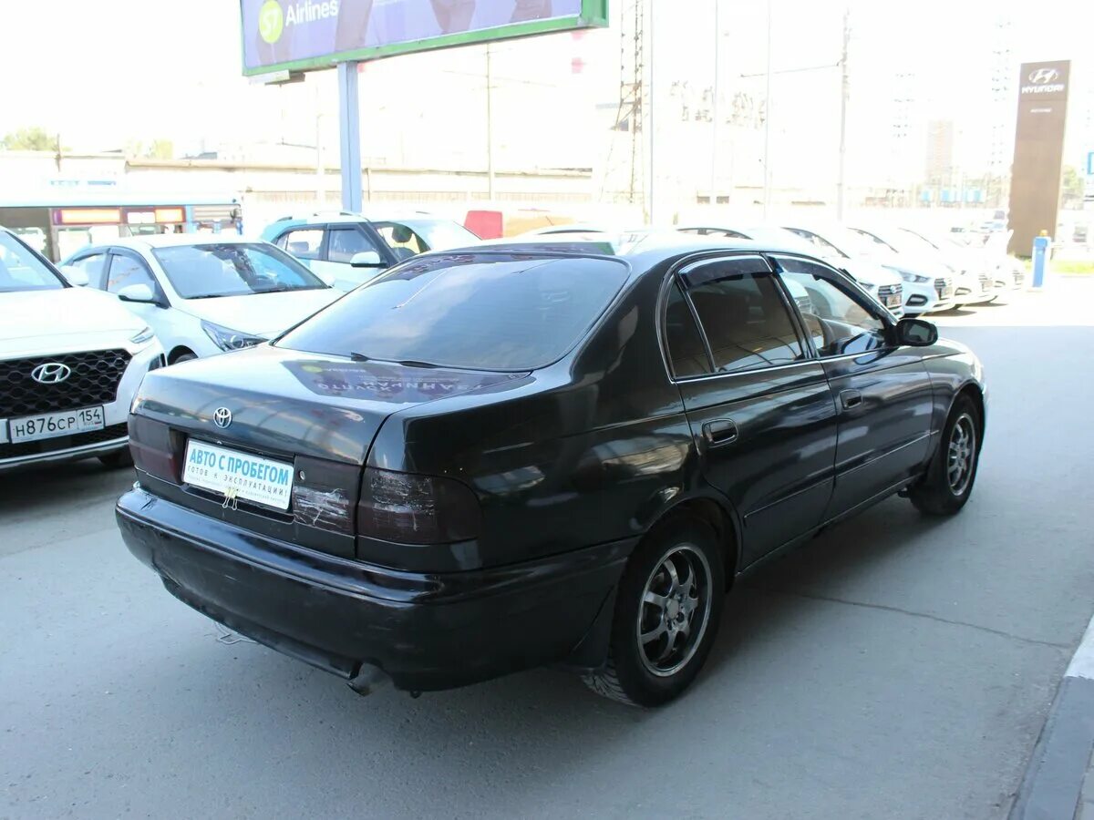 Купить тойота корона в новосибирске. Toyota Corona 190 черная. Toyota Corona 9 (t190). Тойота корона ст 190 черная. Toyota Corona t190 чёрный хрусталь.