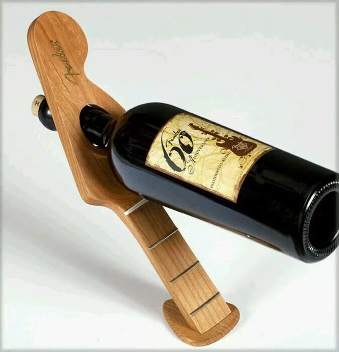 Головоломка для бутылки. Нестандартные бутылки. Под в виде бутылки. Стеклянная бутылка для вина. Подставка под бутылки.