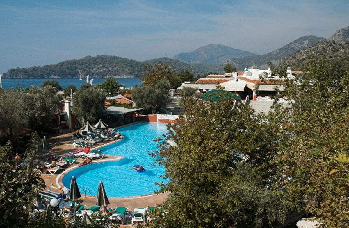 Belcekiz beach club 5. Отель Belcekiz Beach Club. Отель Club Belcekiz Beach Фетхие. Отель Club Belcekiz Beach 5*. Бельчекиз отель Олюдениз Турция.