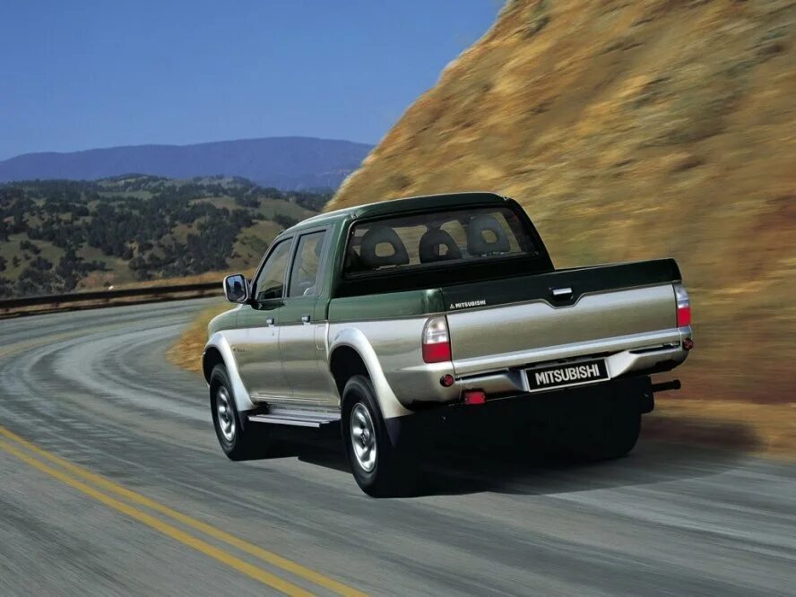 Mitsubishi l200 3. Мицубиси л200 1 поколения. Mitsubishi l200 1990.