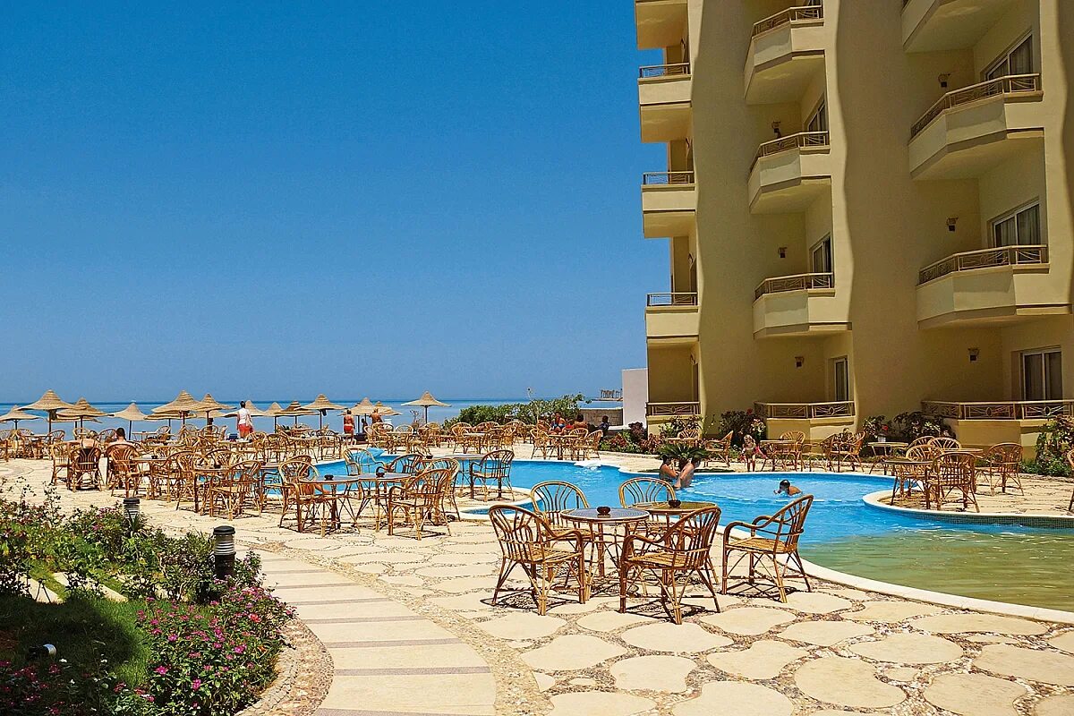 Magic хургада. Египет Хургада Beach Hotel. Magic Beach Resort Hurghada 4. Magic Beach Hotel 4*. Отель в Египте Magic Beach Resort.