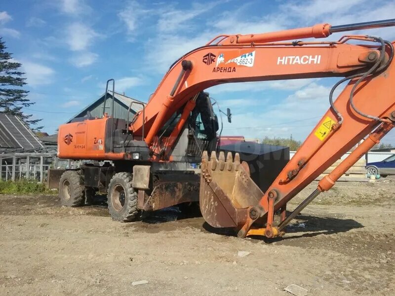 Продажа экскаваторов б у. Hitachi zx210w. Экскаватор Hitachi zx210. Колесный экскаватор Хитачи 210. Колесный экскаватор Hitachi zx210w.