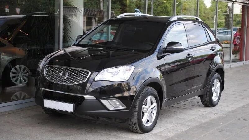 New actyon 2. SSANGYONG Actyon 2010 2.0 дизель. ССАНГЙОНГ 2014 черный. Саньенг Актион черный. SSANGYONG Actyon 2012 черный бок.