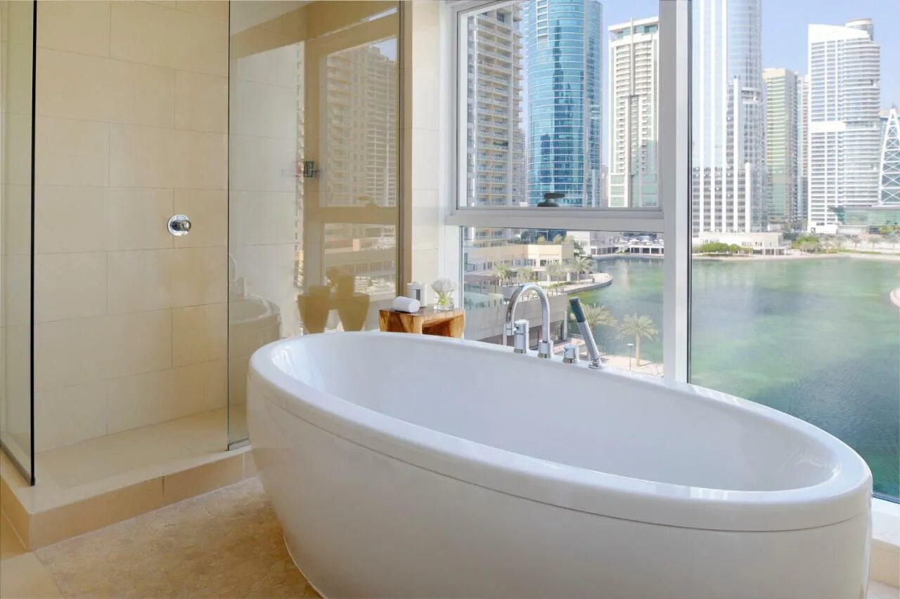 Hotel jumeirah lakes tower. Movenpick hotel jumeirah lakes towers. movenpick jumeirah lakes towers 5. отель дубай jumeirah lake towers. отель movenpick дубай hotel jumeirah lakes towers.