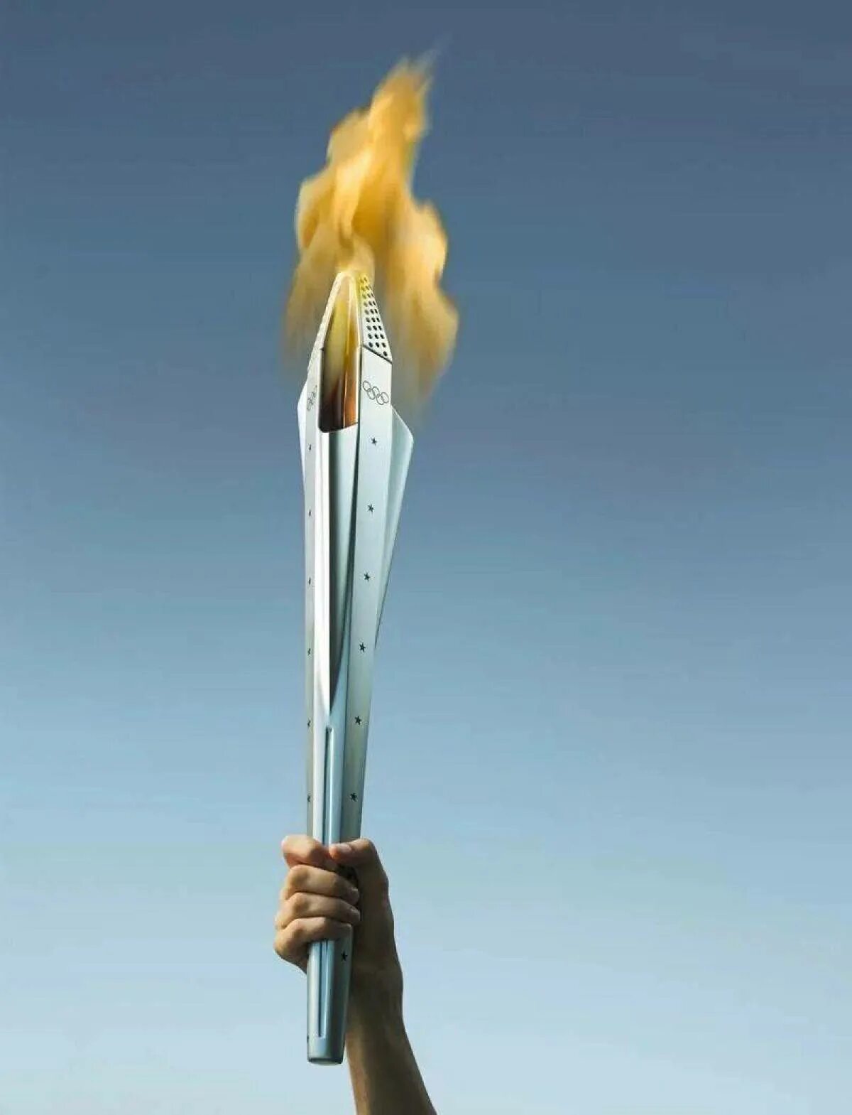 Домашние игры факела. Факел Олимпийских игр. Факел олимпийского огня. Олимпийские игры огонь факел. Олимпийское пламя.