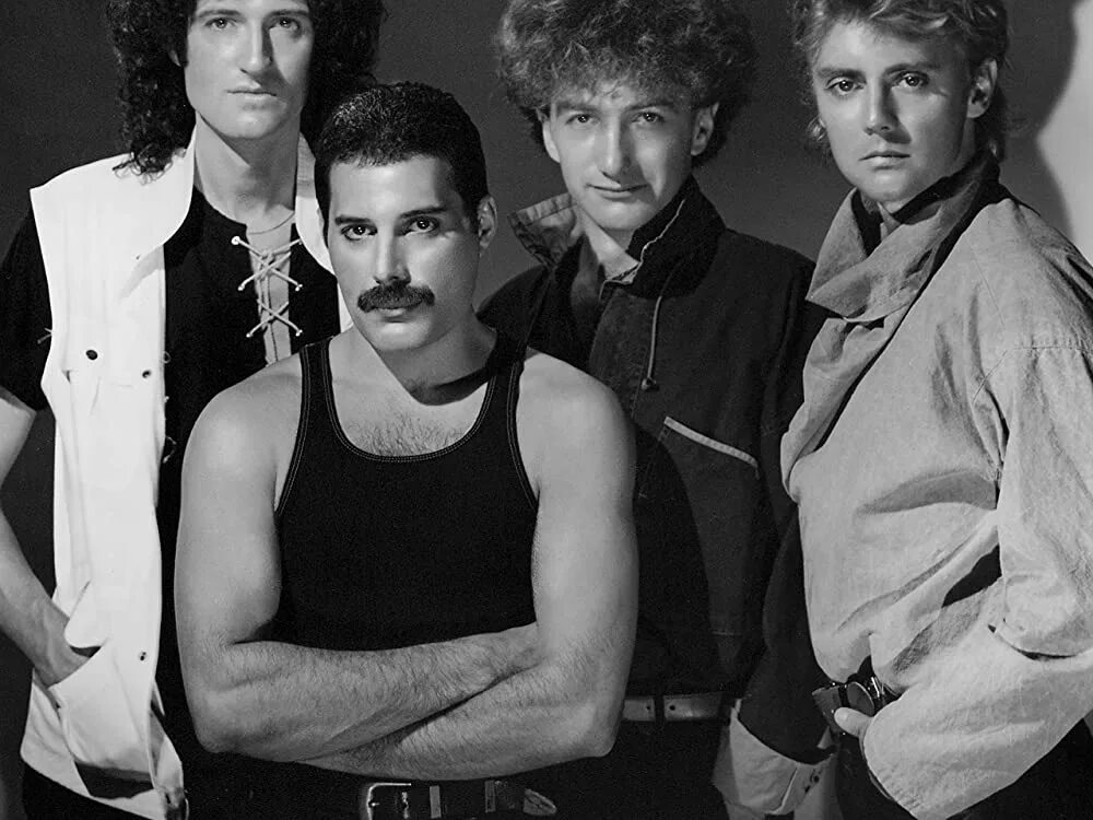 Истории песен queen. Queen в молодости. Queen музыканты. Группа квин. Участники группы queen.