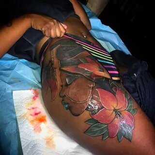 Leg tattoos on dark skin