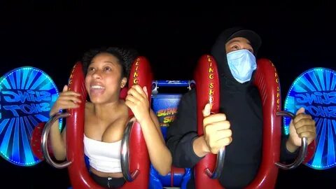 Slideshow tits out on sling shot ride.