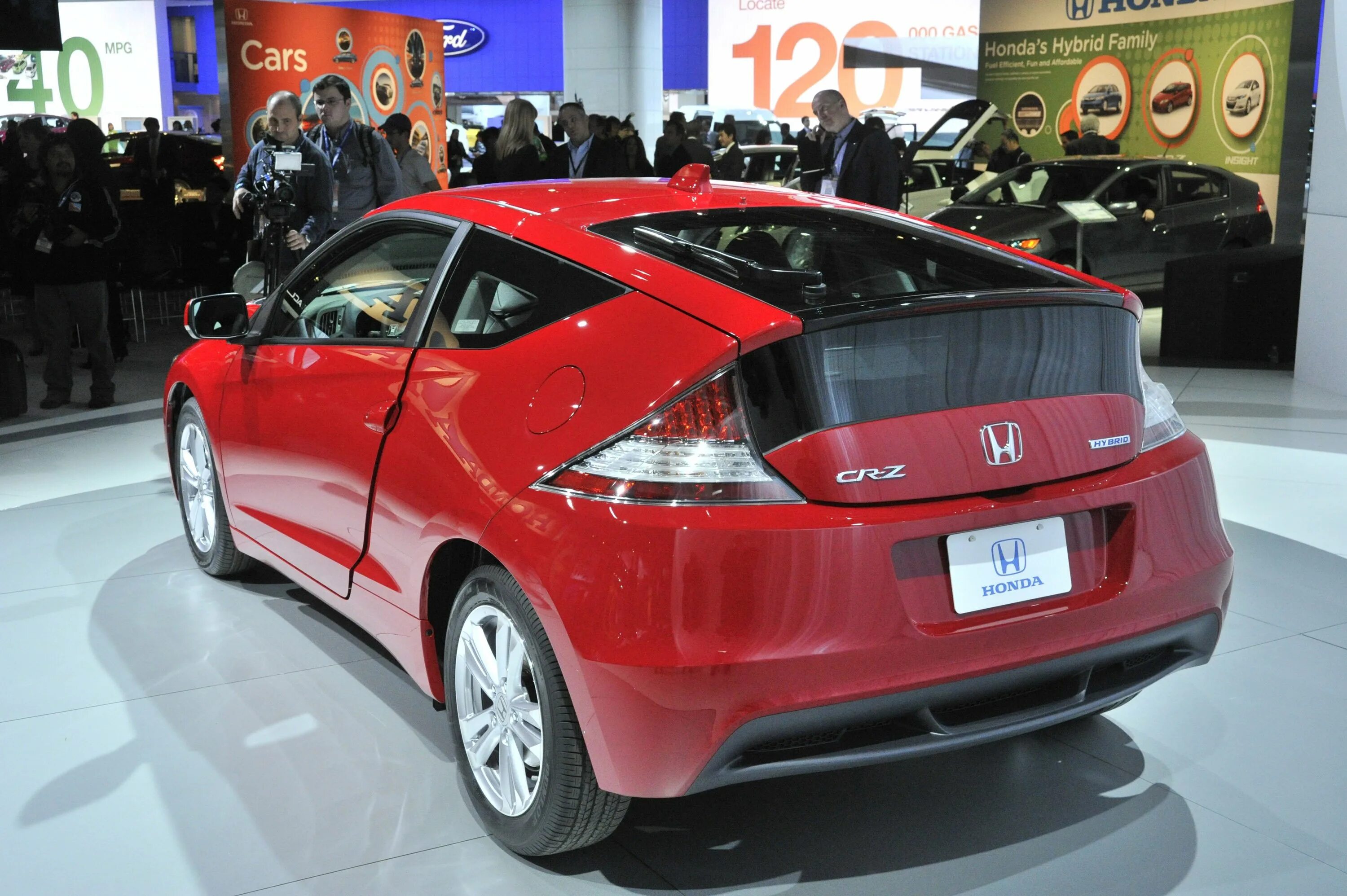 Honda гибрид. Хонда гибрид хэтчбек. Toyota CR-Z. Хонда электромобиль гибрид.