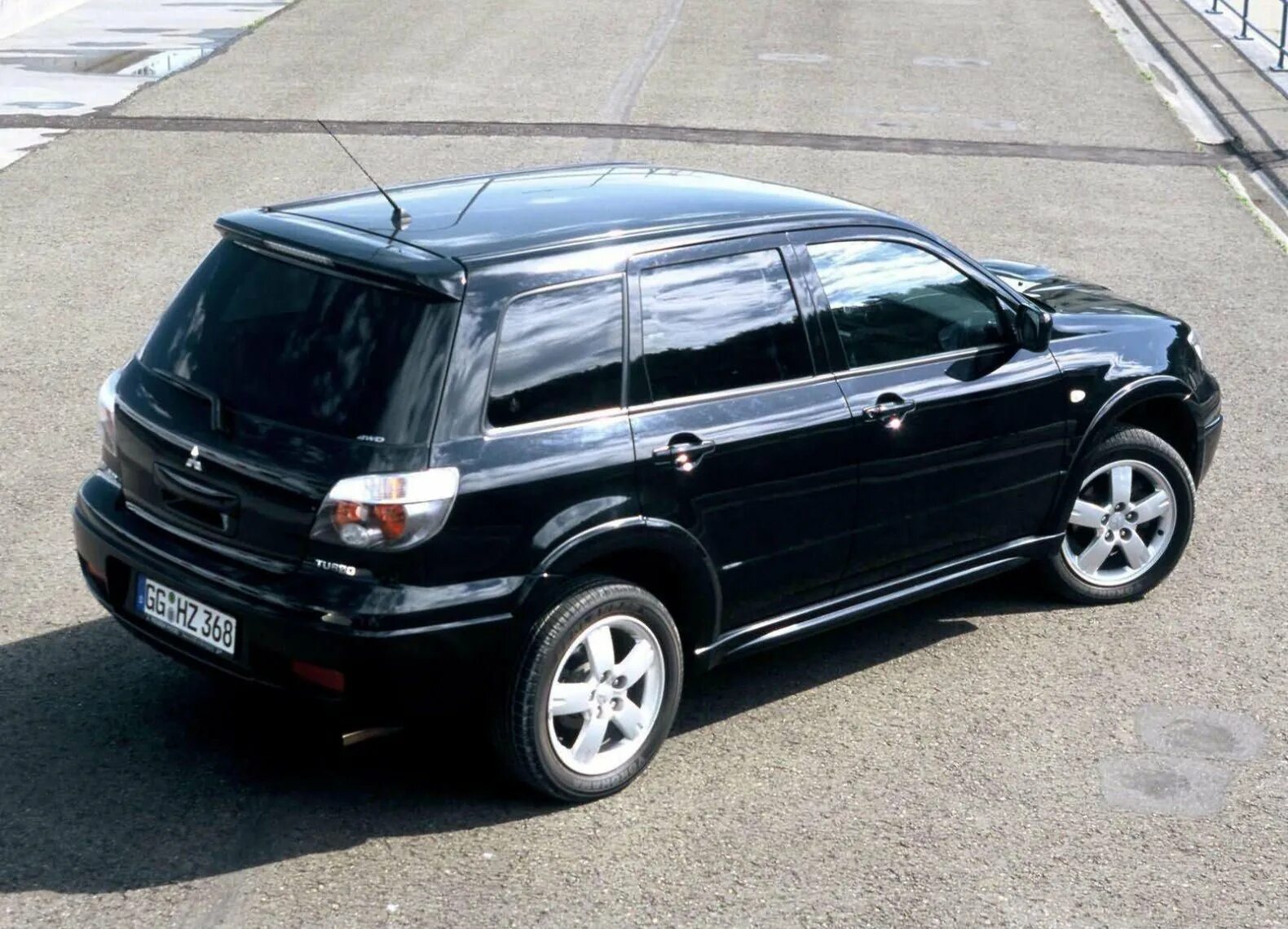 Mitsubishi outlander первое поколение. Mitsubishi Outlander 2005. Митсубиси Аутлендер турбо 2005. Mitsubishi Outlander Turbo 2006. Mitsubishi Outlander 2004.