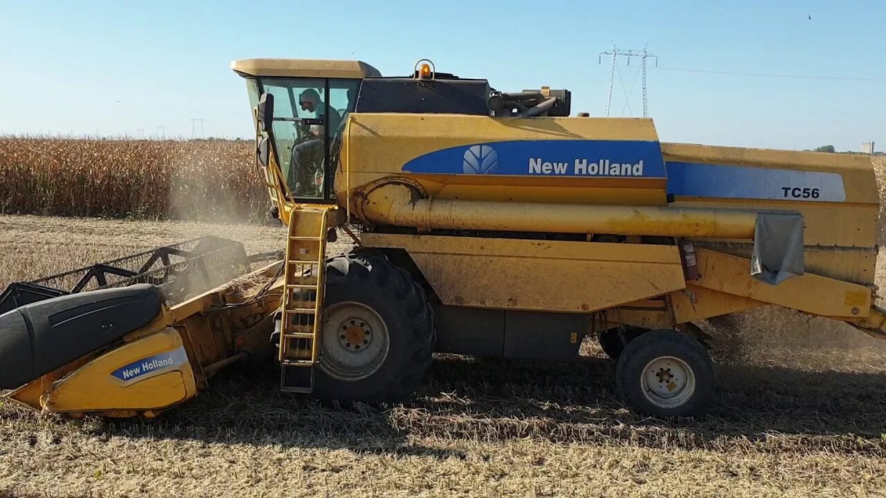 New Holland tc56. Холланд комбайн ТС 56. New Holland тс56 комбайн. Tc56 комбайн зерноуборочный. Каталог new holland