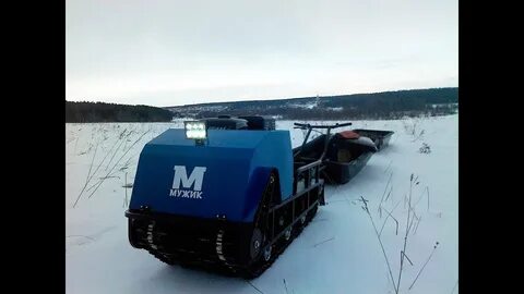 Мотособака по глубокому снегу