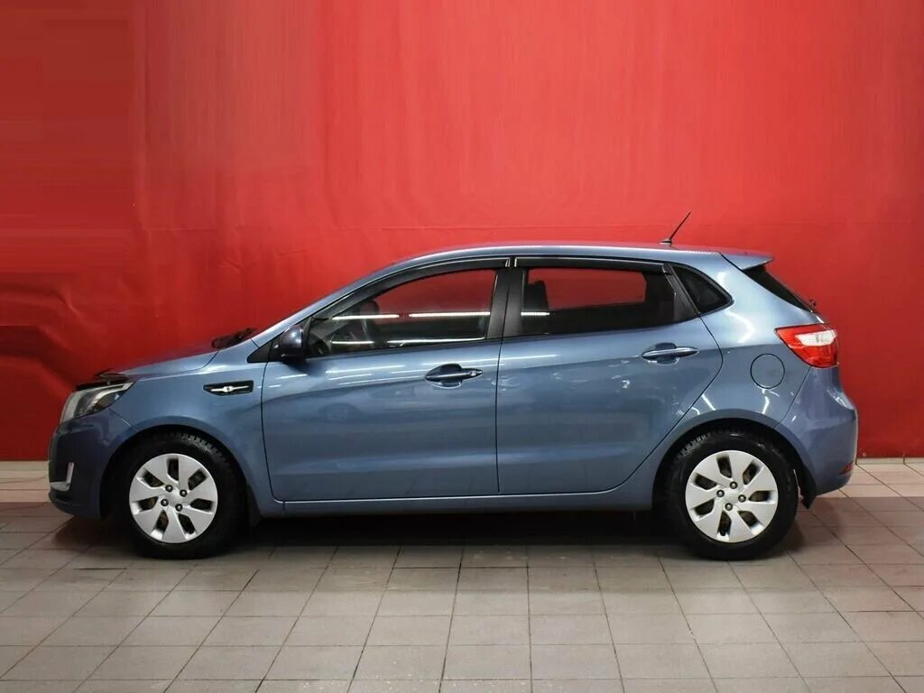 Купить киа хэтчбек с пробегом. Kia Rio 2014 голубая. Kia Rio 2014 хэтчбек. Киа Рио 3 2014 хэтчбек. Kia Rio 1.6 at хэтчбек 2014.