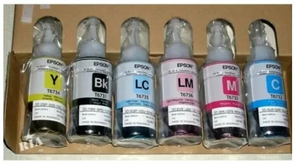 Epson t6734. чернила epson c13t67314a. чернила epson c13t66424a. краска для принтера эпсон л805. чернила эпсон l800 оригинальные.