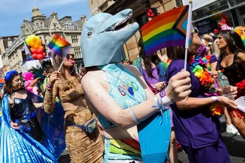 BRIGHTON, ENGLAND - AUGUST 06: Festival goers participate in the Pride LGBT...