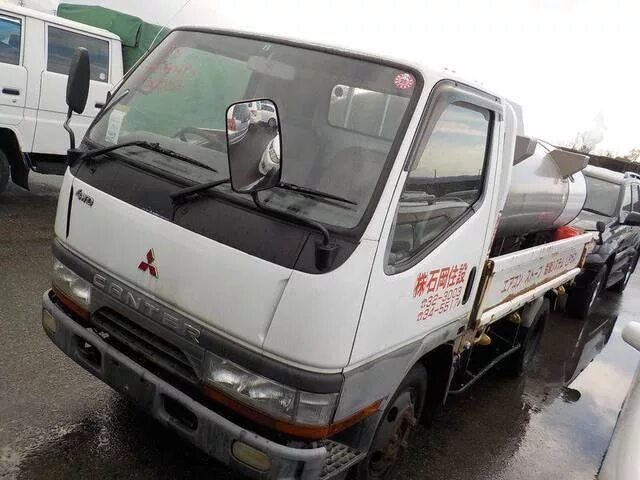 Мицубиси Кантер fg507b 430920. Кабина Мицубиси Кантер 4д33. Mitsubishi Canter Aichi NH-20a. Мутсубиши Кантер 1997 грузовой фургон. Масло митсубиси кантер