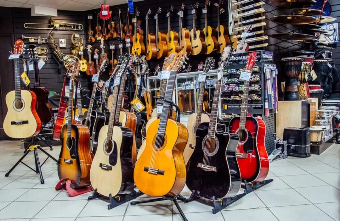 Купить песню магазин. Музыкальные инструменты. Музыкальный магазин. Музыкальные инструменты музыкальный магазин. Магазин гитар.
