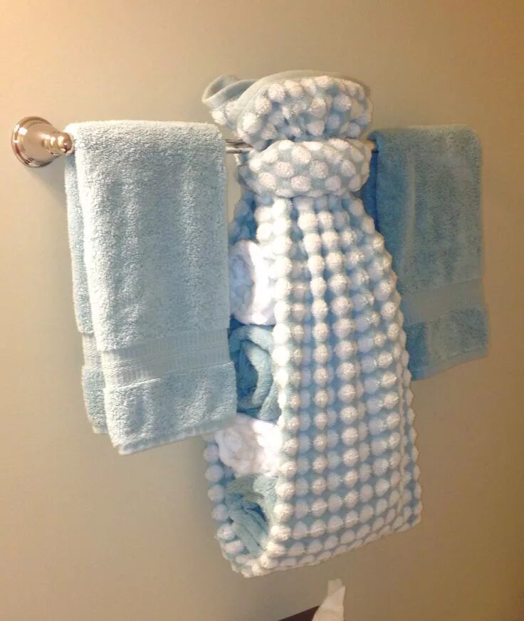 Как хранить полотенца. Хранение полотенец. Хранение полотенец в ванной комнате. Полотенца Bath. Красиво сложенные полотенца в ванной.