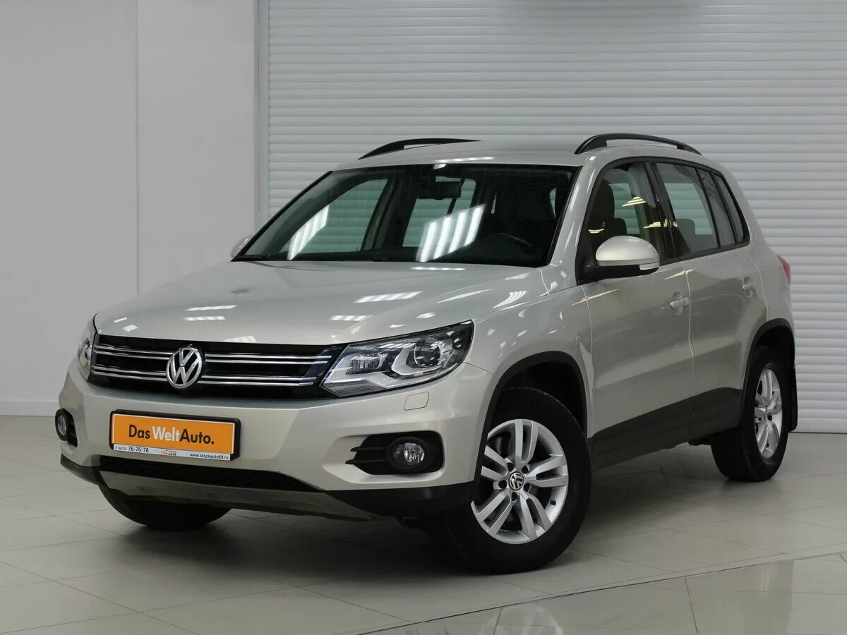 Volkswagen tiguan 2014. Фольксваген Тигуан 2014 года. Тигуан Рестайлинг 2014. Tiguan Рестайлинг 2014. Фольксваген Тигуан 2014 белый.