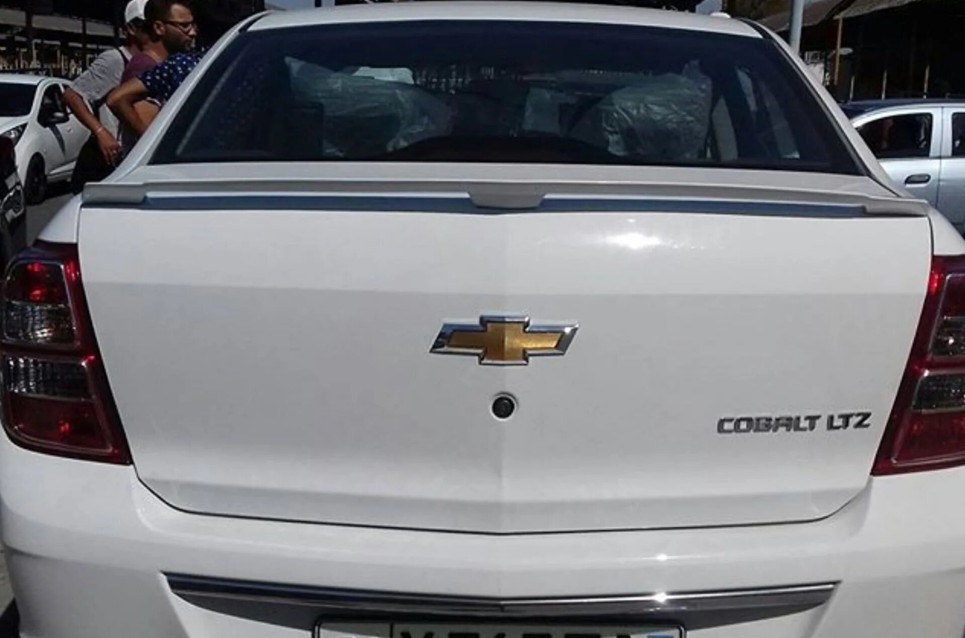 Chevrolet Cobalt спойлер. Задний багажник спойлер Шевроле кобальт. Chevrolet Cobalt антикрыло. Спойлер на Шевроле кобальт 2013. Телеграмм фото под спойлер