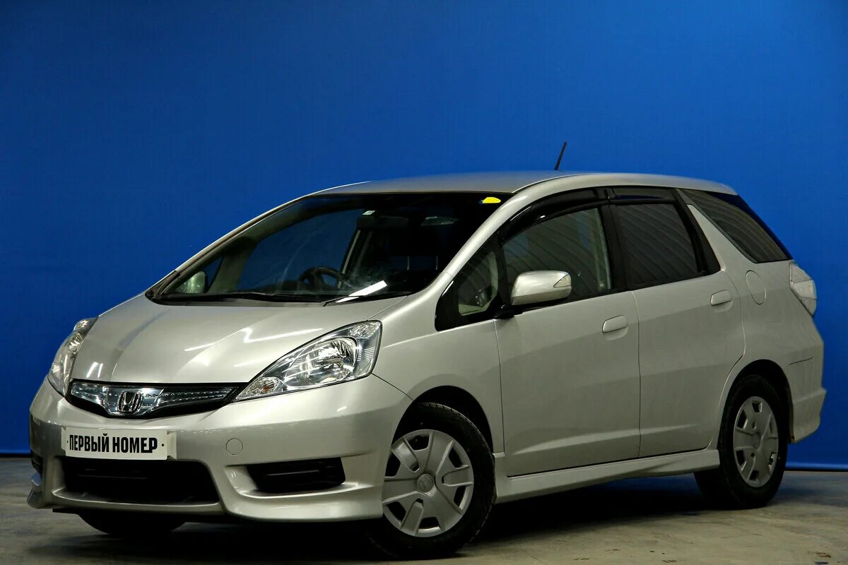 Фит шаттл 2011 год. Honda Fit Shuttle 2012. Honda Fit Shuttle 2011. Honda Fit Shuttle i 2011. Honda Fit 2011.