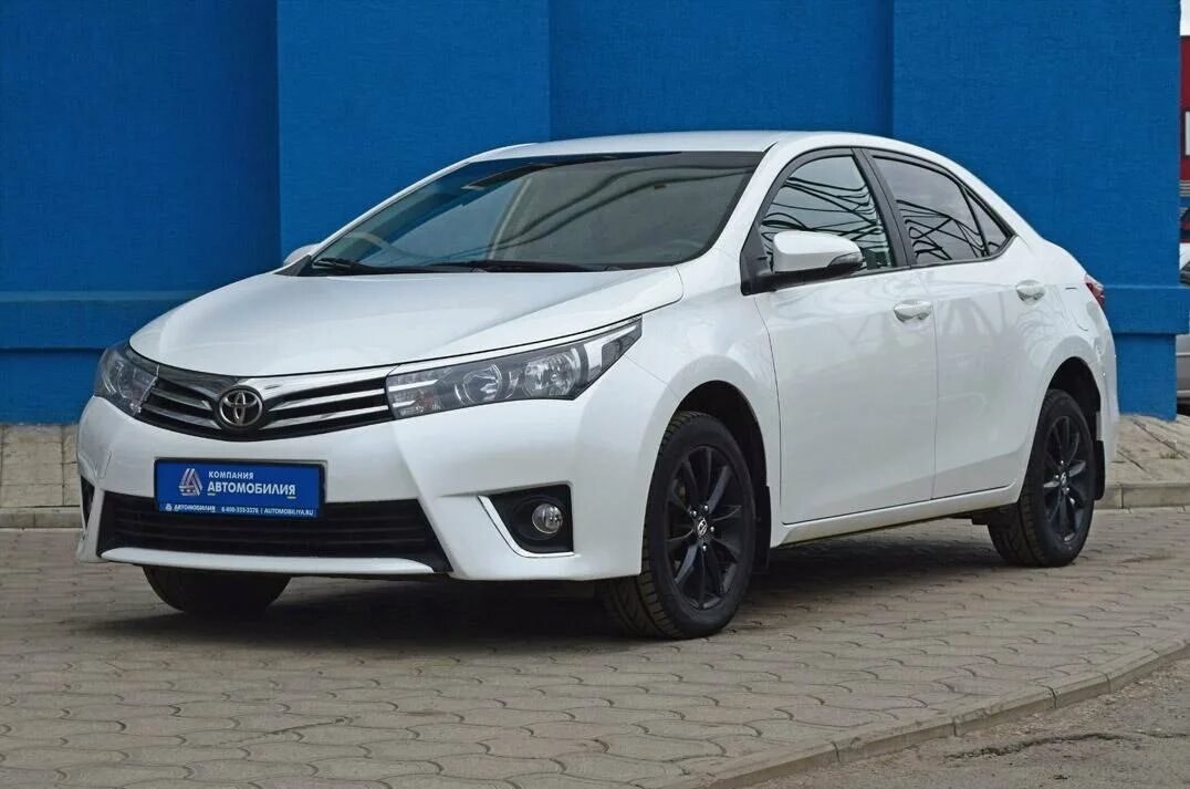 Тойота королла производитель. Toyota Corolla XI e160 e170. Toyota Corolla 11. Тойота Королла 11 е160 е170 2013. Тойота Королла 11 поколения.