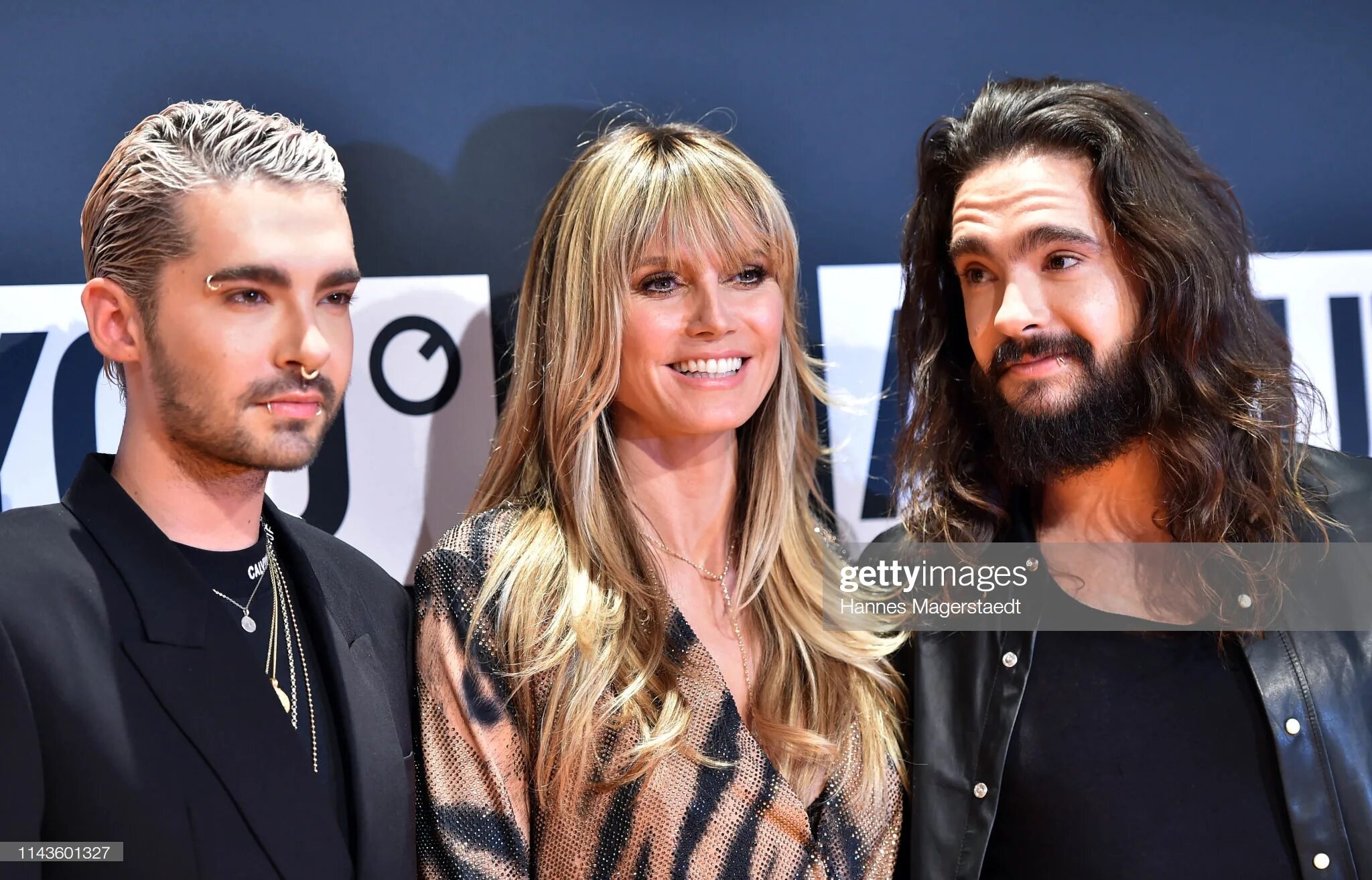 Клум и каулитц. Тома каулитц и хайди клум. Клум и каулитц. Хайди клум и том каулитц. Том из токио хотел и хайди клум.