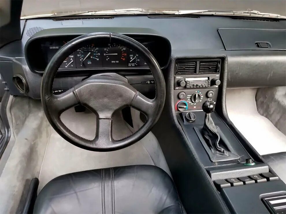 Delorean dmc-12 салон. Делориан дмс 12 салон. Салон 12 машины. Ваз 2112 2005 салон. Ваз 2112 в люксовой комплектации.