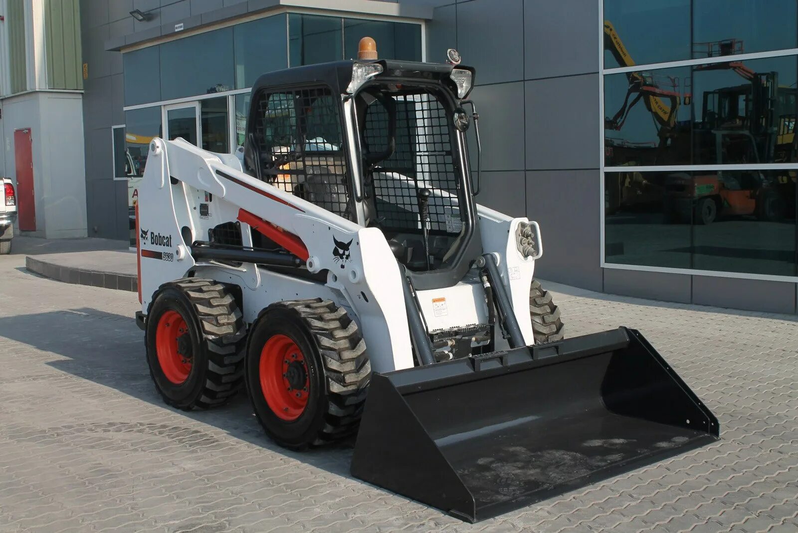 Погрузчик Bobcat s630. Мини погрузчик Bobcat s630. Мини-погрузчик Bobcat s 630 Бобкэт. TCM фронтальный погрузчик Bobcat s530. Bobcat новый