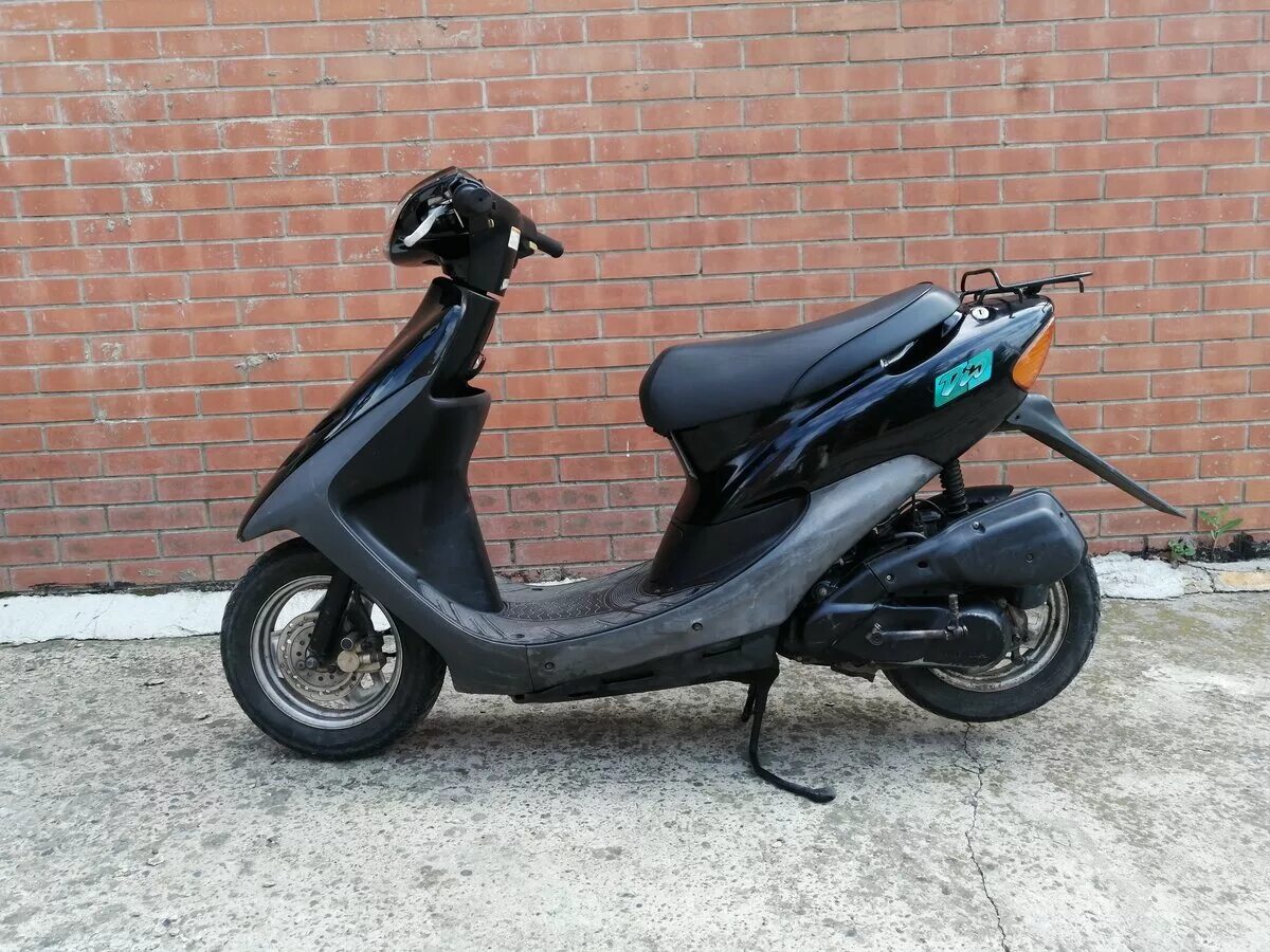 Dio отзывы. Хонда дио 34. Мопед Хонда дио 34. Honda Dio 34 черная. Хонда дио 35.