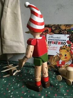 Игрушка буратино