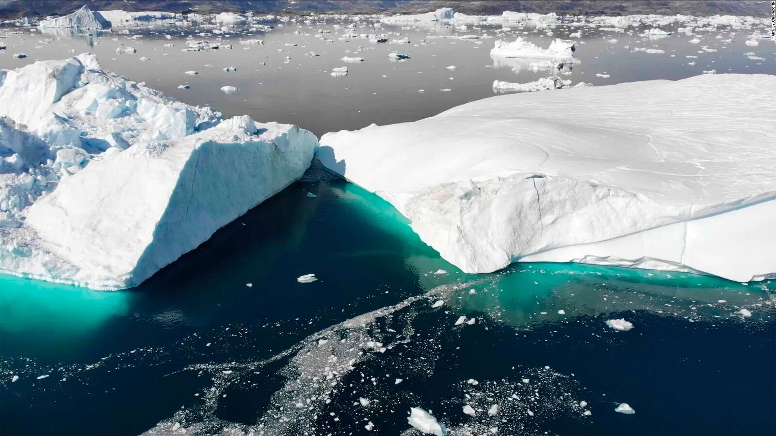 Большой остров покрытый льдами. Таяние ледников в Гренландии 2022. Таяние ледников в Гренландии. Ледяной щит Гренландии. Гренландия ледник Антарктида Арктика Гренландия.