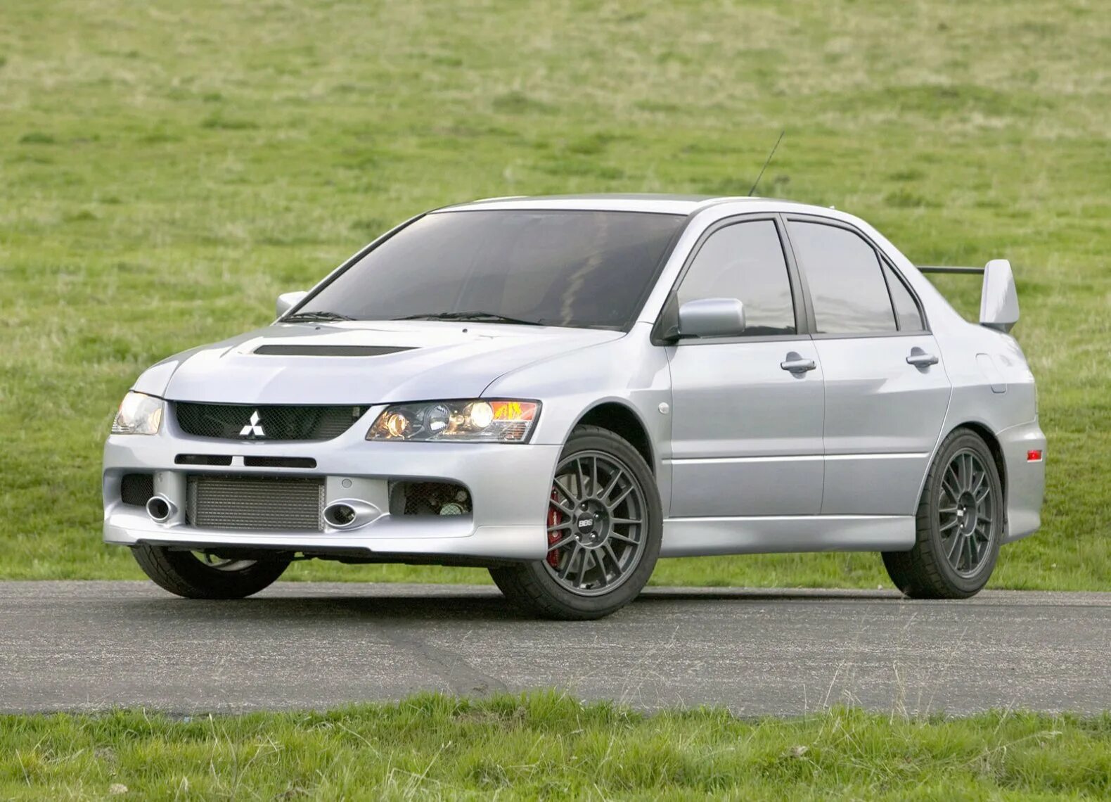 Видео lancer. Mitsubishi lancer evolution 2006. 2006 mitsubishi lancer evolution ix mr. митсубиси лансер эволюшн 2006. митсубиси лансер революшен.