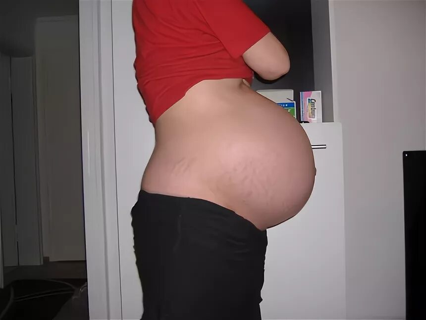 Живот на 34 неделе беременности.