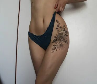 Dainty thigh tattoos for women