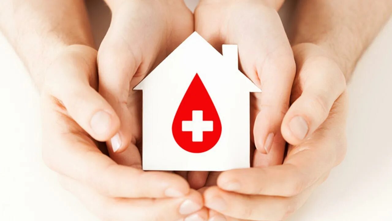 Рук донора. Красный крест донорство крови.