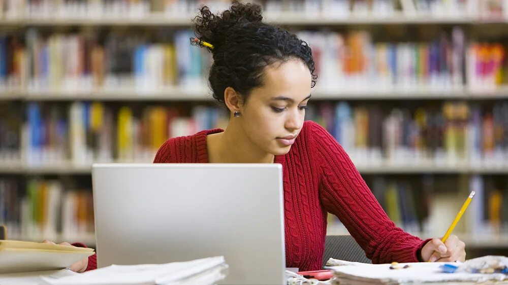 She a good student. Student. Students in Library. Best student. Best pupil.