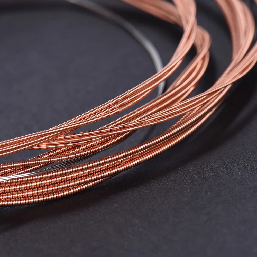 бронзовые струны. медные струны для акустической гитары. медные струны. медные струны для гитары 1992 год. медные струны для гитары 1992 год.