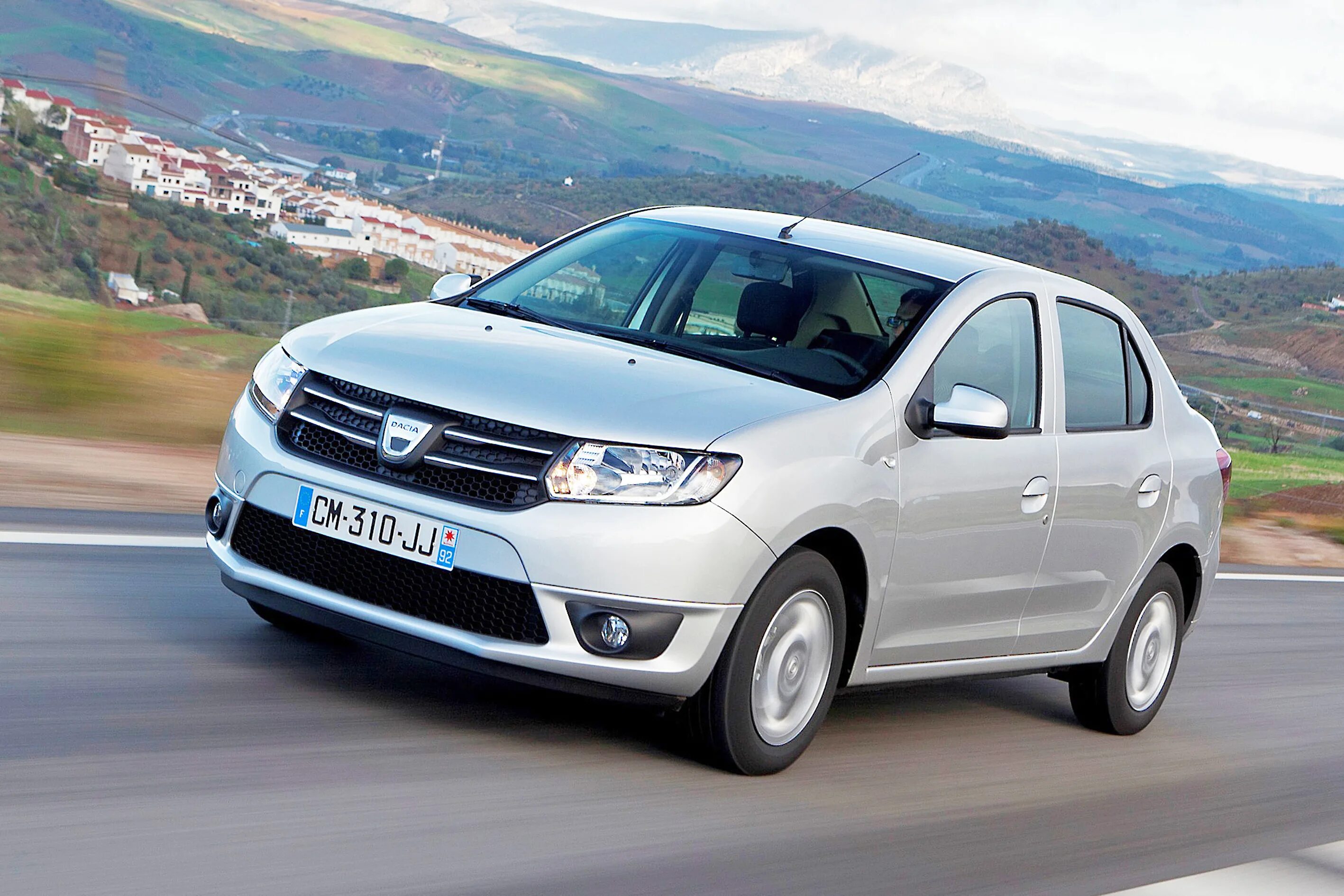 Машина логан фото. Dacia Logan 2013. Рено Логан Дачия 3. Dacia Logan 2014. Дачия Логан седан.