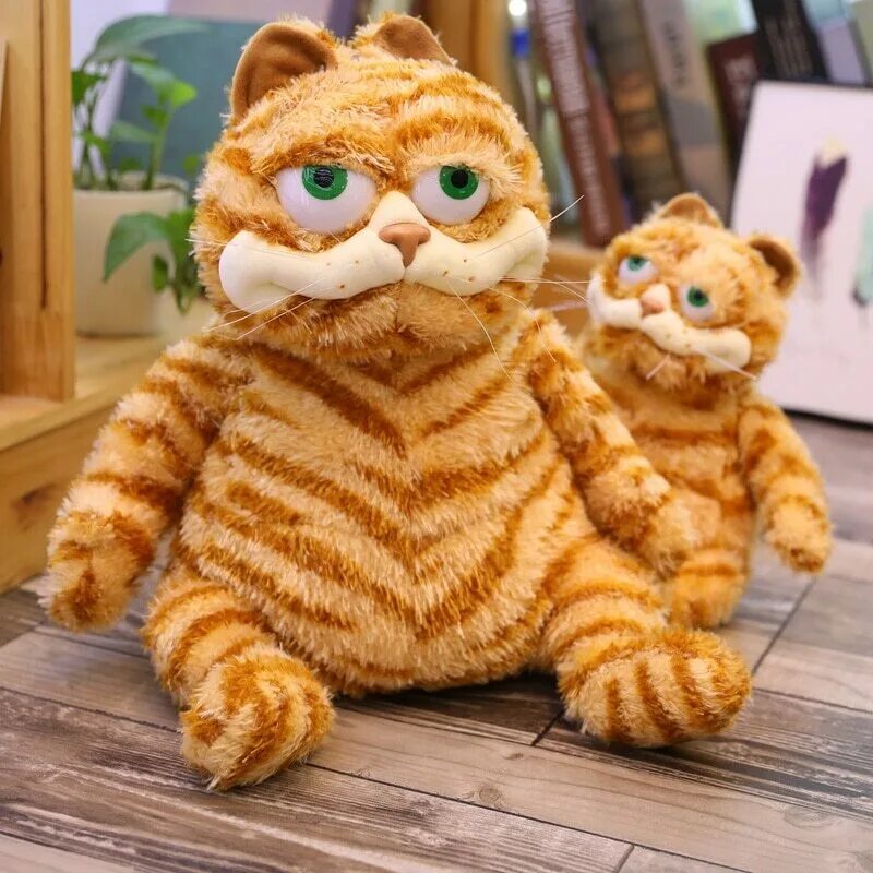 Игрушки из толстых. Плюшевая игрушка Гарфилд. Плюшевый кот Гарфилд. Garfield мягкая игрушка. Кот Гарфилд игрушка.