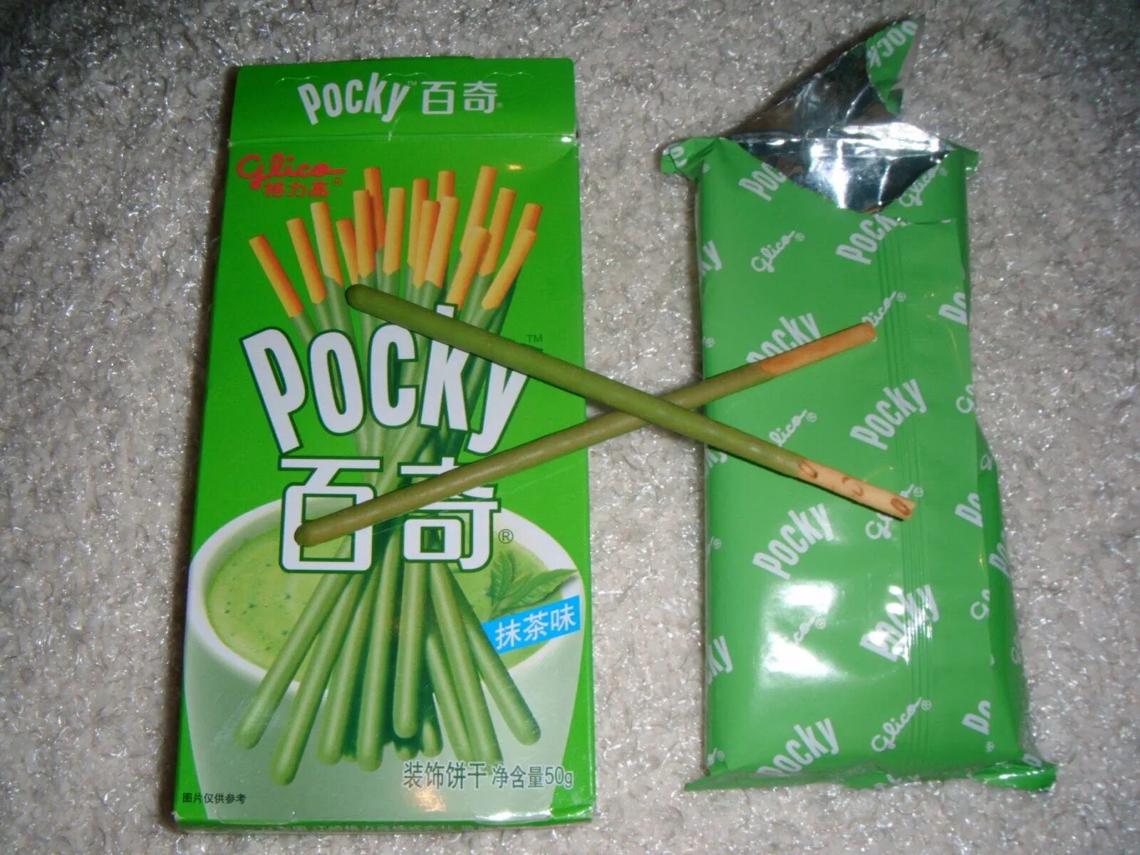 Где купить чай на палочке. Pocky Green Tea. Pocky зеленый чай. Pocky палочки. Палочки с зеленым чаем.