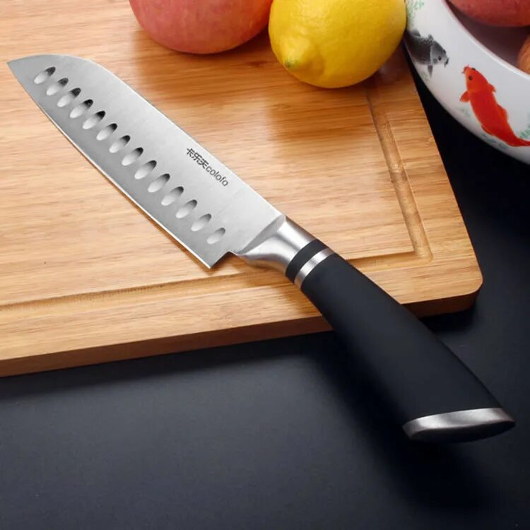 Кухонный нож из нержавеющей стали. Santoku Knife кухонный нож. Японский поварской нож сантоку. Шеф нож сантоку. Японский кухонный нож сантоку.