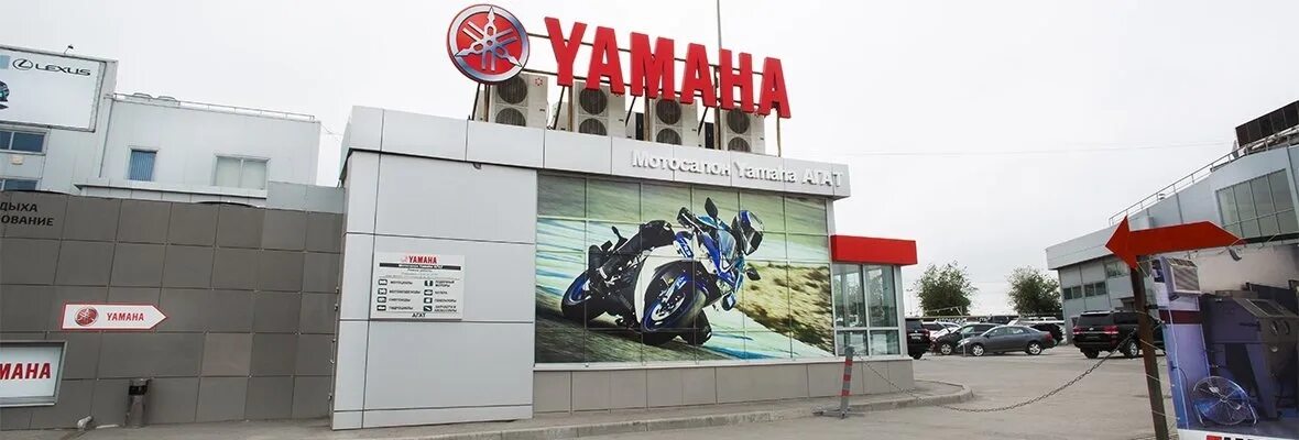Эмблема ямаха мотоцикл. Yamaha эмблема. Yamaha xsr700 scrambler. Yamaha lexi frice. Скутер yamaha 50cc.