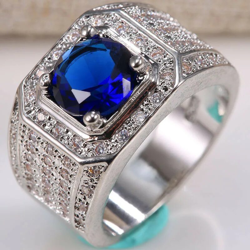 Синее золотое кольцо. Мужской перстень платина сапфир. Перстень Sapphire Ring for men. Кольцо с сапфиром серебро. Мужской перстень с сапфиром из серебра.