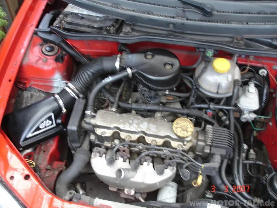 Двигатель opel 1.2. Opel Corsa b мотор 2.0. Opel Corsa c 1.2 мотор.