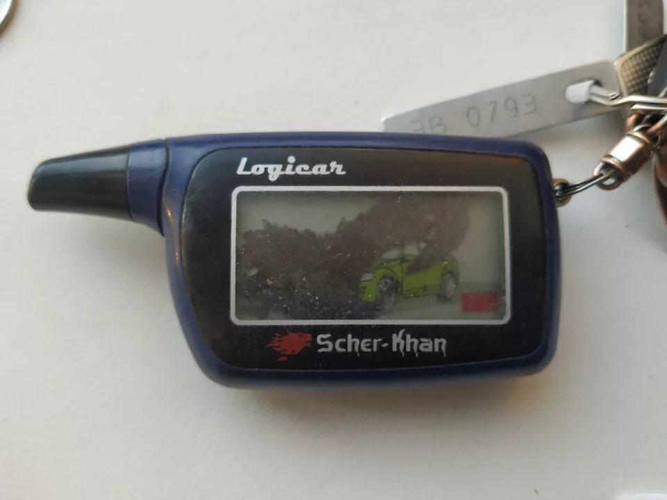 Брелок сигнализации шерхан 2. Scher-khan logicar 2 брелок 2. брелок scher-khan logicar a. брелок scher-khan logicar 1. сигналишация sher khan logicar 2.