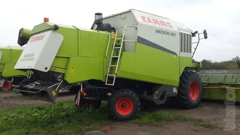 Уборка claas medion. Claas medion 310. Комбайн клаас монтана. Медион 310. Claas medion 330.