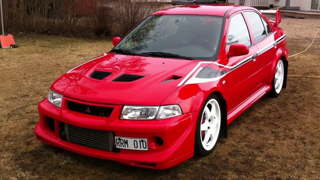 Эва митсубиси. Mitsubishi Lancer EVO 6.5. Mitsubishi Lancer Evolution 6 Tommi Makinen Edition. Эво 6 Митсубиси Томми Мякинен. Mitsubishi Lancer Evolution 6.5 TME.