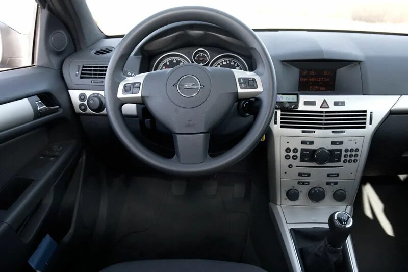 Opel astra 2008 салон. Opel astra h центральная панель. Opel astra 2008 салон. Opel astra 2008 салон. Опель астра h 2010г седан салон.